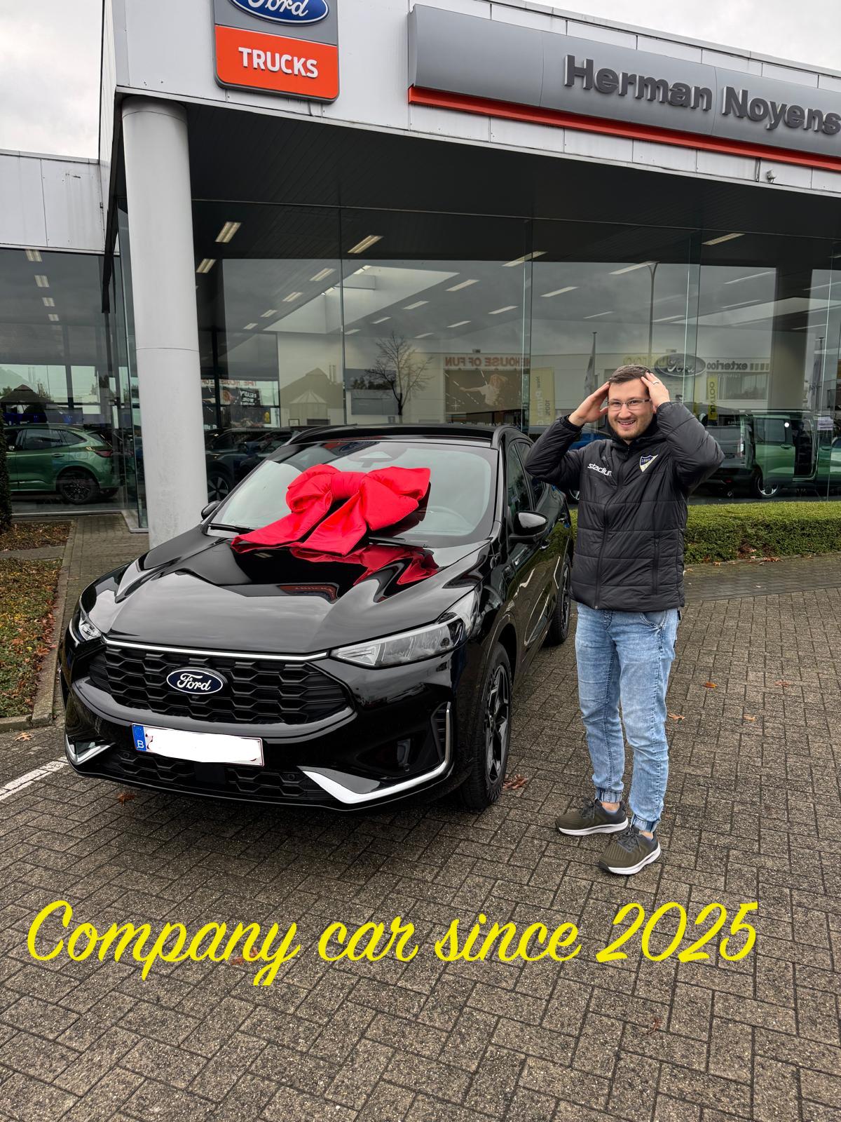 New company car parked outdoors